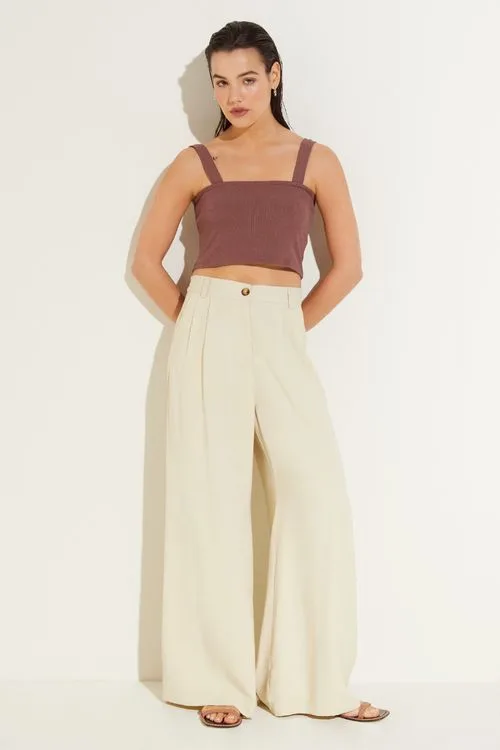 top marron y jean crudo Cuesta blanca