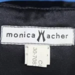 Monica Acher logo